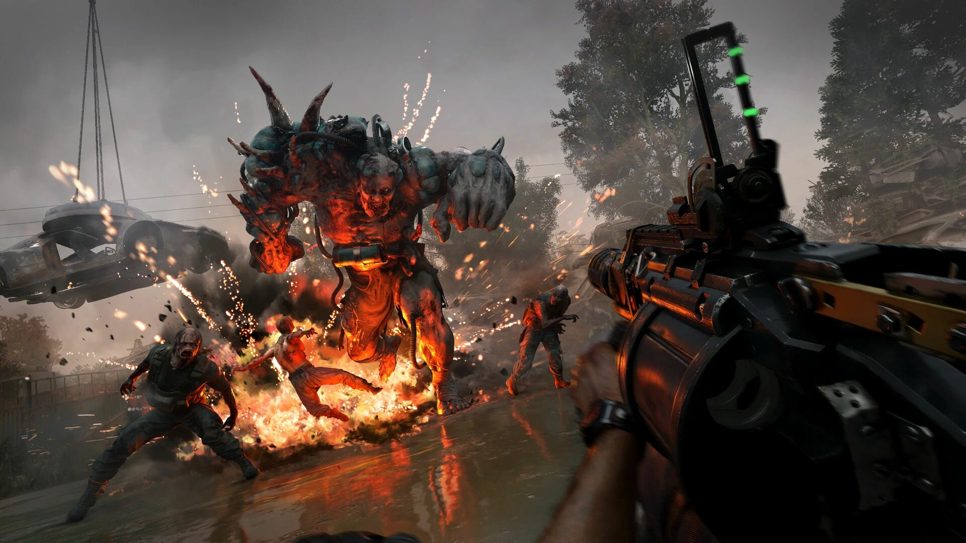 A first-person view of a survivor fighting a large, dangerous zombie mutation in Dying Light